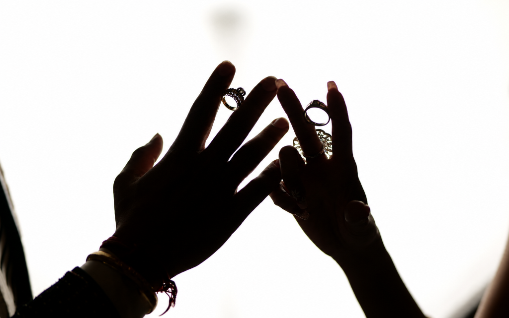 Ugant Studio Wedding Rings & Hands Silhouette